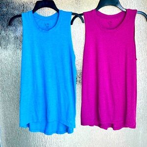 Bundle of 2 small blue and fuchsia Champion duo dry tank tops